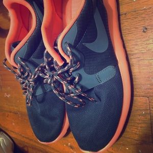 neon orange and navy blue nikes